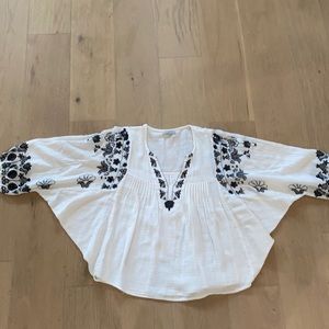 Dolman sleeve shirt, white embroidered with black flowers, size S/M.